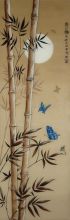 Синяя бабочка на листе бамбука