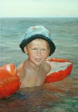 Портрет мальчика в море.